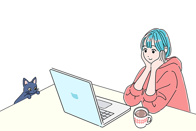 パソコンで動画を見ている女の子と猫